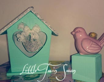 Decorative bird nest with bird