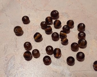 Shaped elongated, faceted, black with reflections, 4mm