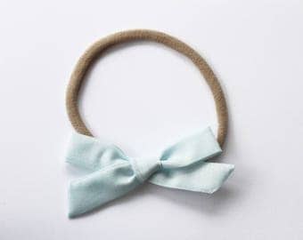Sky Blue Bow on Nylon Headband - Classic Style Bow
