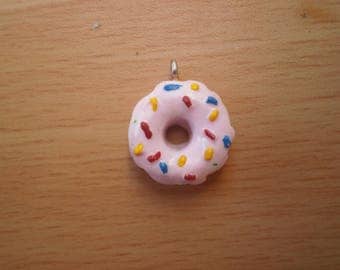 Pink donut charm and multicolored sprinkles