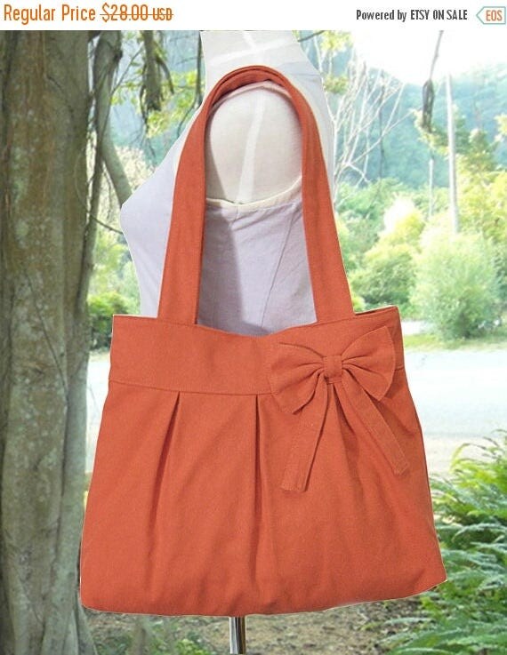 On Sale 20 off orange cotton fabric purse with bow / canvas