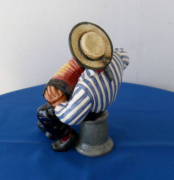 Items similar to ROYAL DOULTON SAILOR with Accordion Jolly Roger