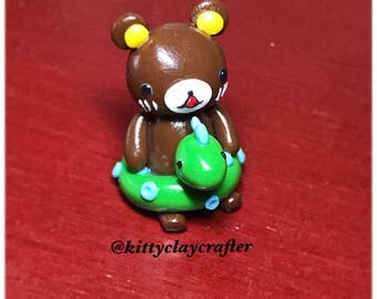 Rilakkuma in a floaty