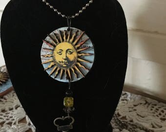 Medieval sun on map circle of wood, 1.5 in. and Tolkien quote on back