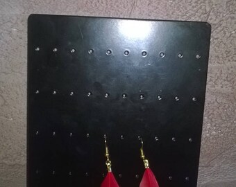 pierced earrings handmade with feathers