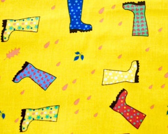 Multi-colored boots on yellow background
