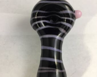 Glass smoking pipe, hand blown, spiral design tobacco pipe. Pink on black glass a pink dot.