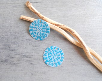 X 2 sequins glazed light grey and turquoise charms (one side pattern and a solid)