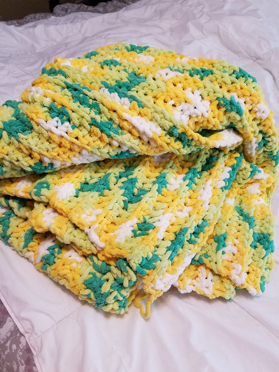 Soft chunky yarn blanket..shadea of green yellow and white