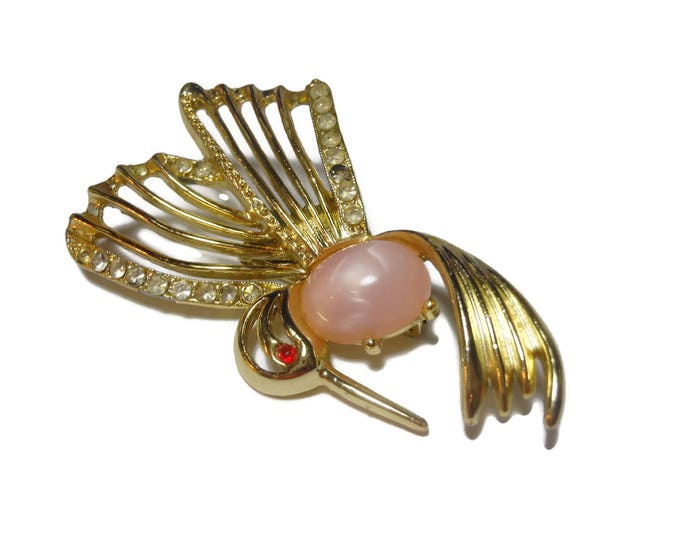 Jelly belly hummingbird brooch, gold hummingbird with pink lucite belly, red rhinestone eye and clear rhinestone embellishments, bird pin