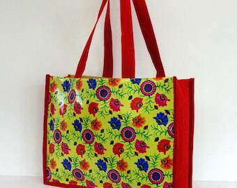 Plastic canvas tote bag yellow raincoat and flowers colorful shopping bag