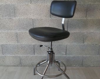Top metal and chrome shop stool