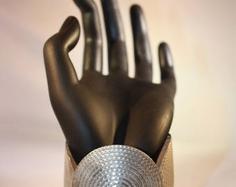 Silver tone costume braclet