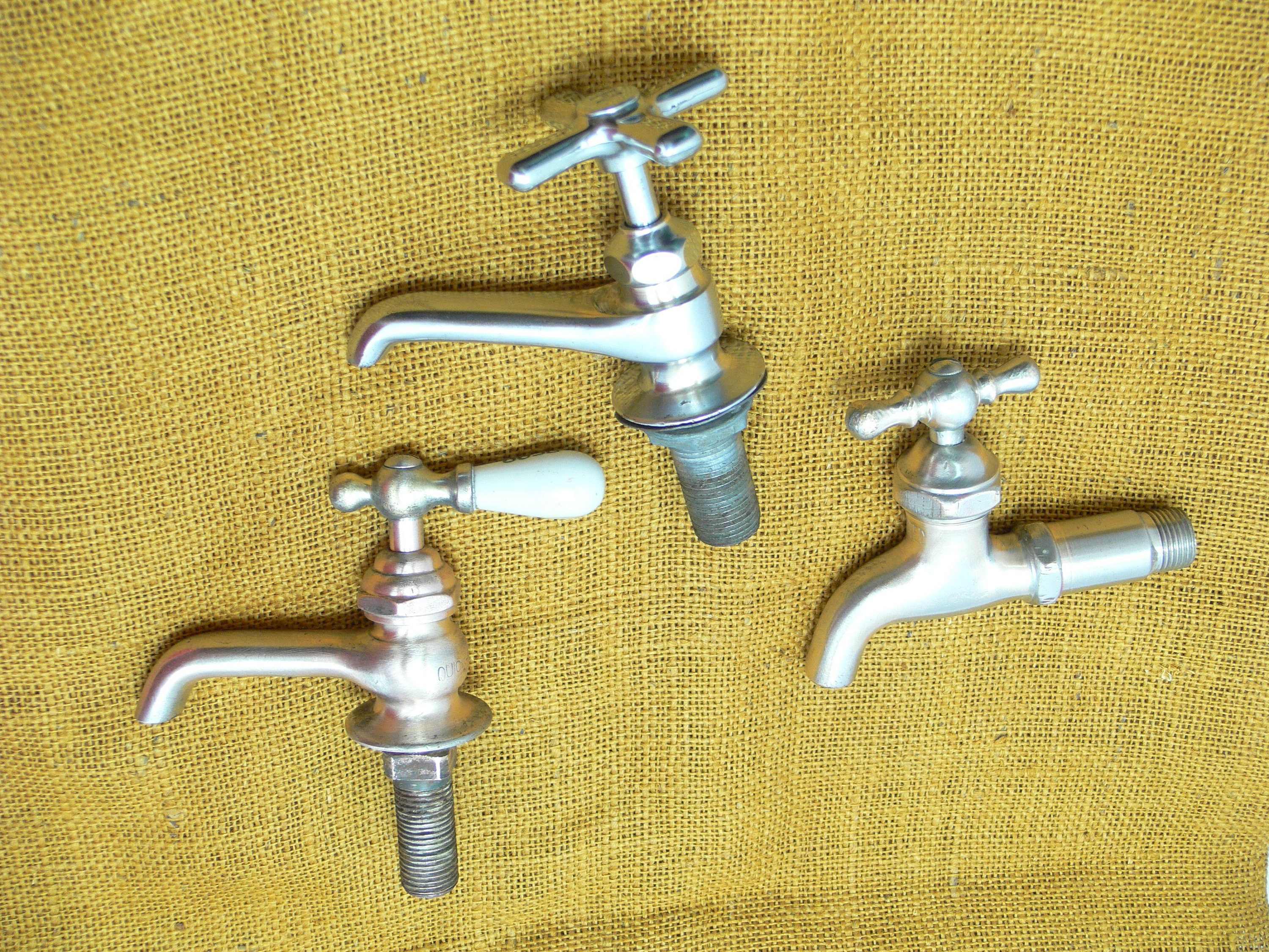 old faucets for old sinks in bathroom