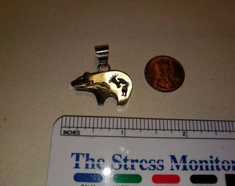 Vintage Sterling silver Zuni bear with pierced Kokopele design pendant