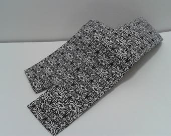 Camera strap cover. Black and white pattern, cotton. Pocket.