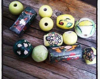 set of 12 yellow ceramic beads green and Brown mix of shapes and sizes