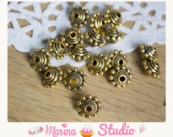 10 beads 10x7mm gold gilt antique bali type