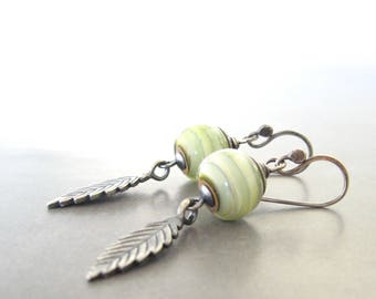 yellow lampwork and silver earrings, rustic dangle earrings, oxidized jewelry, chartreuse boho earrings, botanical jewelry