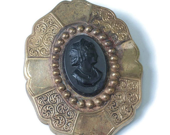 Victorian Era Black Cameo Brooch Chased and Smooth Segmented Setting