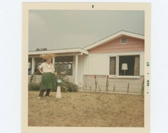 Backyard Hula Skirt Man, 1967: Vintage Snapshot Photo (77594)