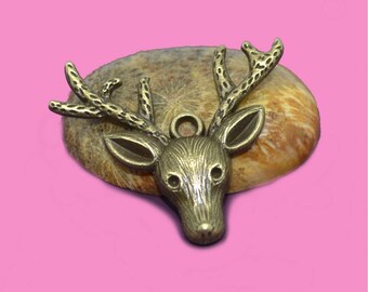 2 breloques tête de cerf 40x40mm couleur bronze