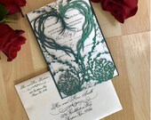 laser cut pinecone winter wedding invtiation paper heart grapevine wreath and berries fall rustic forest