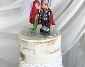 Ariel Standing kissing Thor