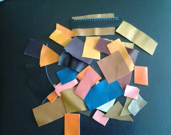 over 20 different color leather scraps