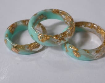 Resin Stacking Rings! Opaque minty and clear resin rings with gold flakes embedded throughout! A beautiful fashion statement!