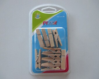 Box of 10 clothespins natural wooden 35 mm.