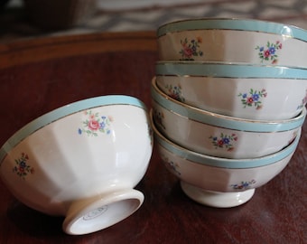 Beautiful French vintage cafe au lait bowls witha pastel blue trim and flowers