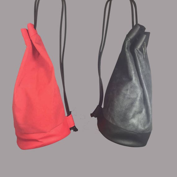 Designer bag Backpack "ROUND" Kunstleder black or red