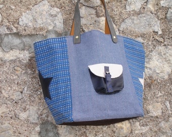 Blue woven canvas and leather tote bag