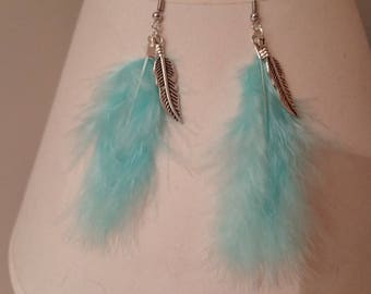 Earrings with turquoise feathers