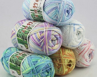 Balls of wool, bamboo, various colors