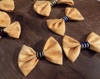 8 bow yellow/gold color sand with a wax