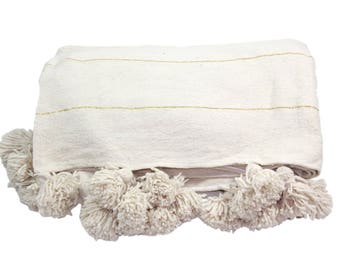 mint colored moroccan pompom blanket