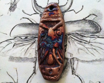 198. Wondrousstrange Raku Tribal Large Blue Copper Pendant