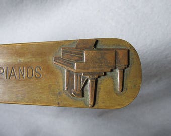 Antique Bronze Desk ,Letter Opener with Piano Advertisement, Grand Piano