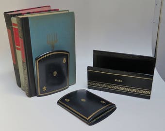 Pair of Vintage Book Ends Black Leather with a gold stamped design folding bookends