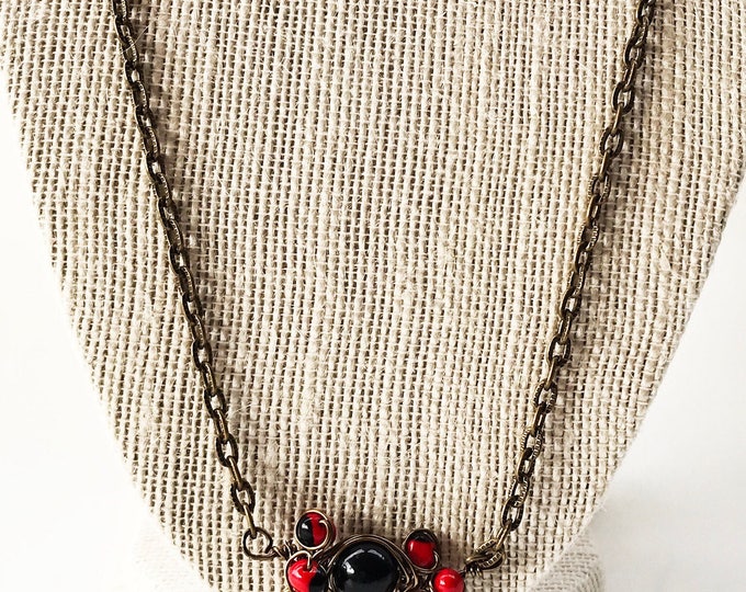 Huayruro Necklace, Andean Necklace, Red and Black necklace, Brass huayruro necklace