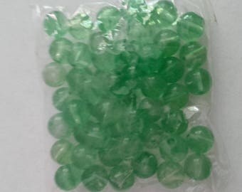 Set of 50 light green glass beads