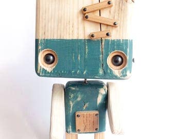 Blue robot made of recycled wood - factory