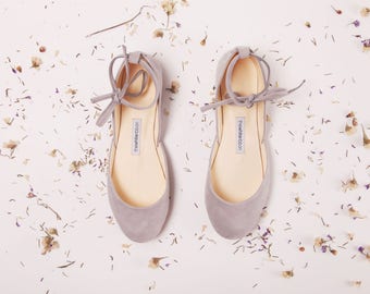 the white ribbon ballet flats