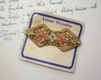 Antique brooch with original packaging