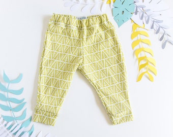 Mimosa yellow organic cotton baby leggings.