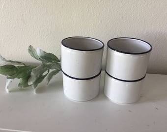 Four Blue and White Enamelware Mugs