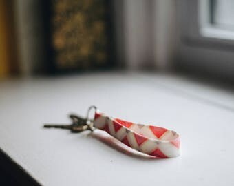 Keychain in a Geometric Red and Gray Pattern