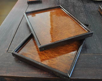 2 medium sized serving trays made of african Wenge, Redwood burl top, Oukome bottom. Maple trim around corner inserts